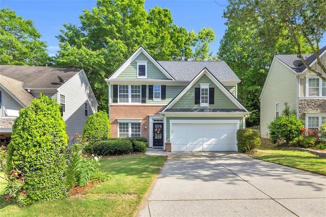 335 Pintail Ct, Suwanee, GA 30024 - traditional-style house featuring brick siding, concrete driveway, a front yard, and a shingled roof