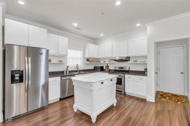 335 Pintail Ct, Suwanee, GA 30024 - kitchen featuring stainless steel appliances, open shelves, a sink, white cabinets, and ornamental molding