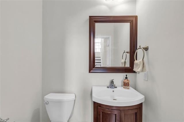 335 Pintail Ct, Suwanee, GA 30024 - half bathroom featuring vanity and toilet