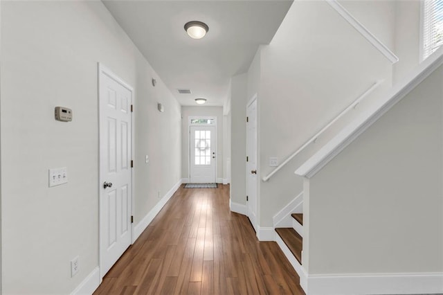 335 Pintail Ct, Suwanee, GA 30024 - foyer entrance featuring stairway, wood finished floors, and baseboards