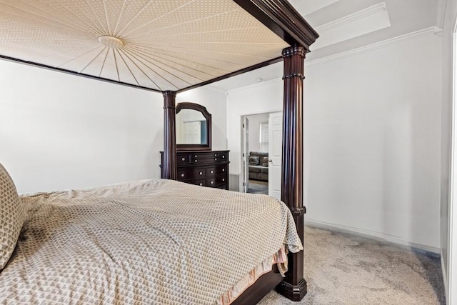 bedroom with ornamental molding and carpet