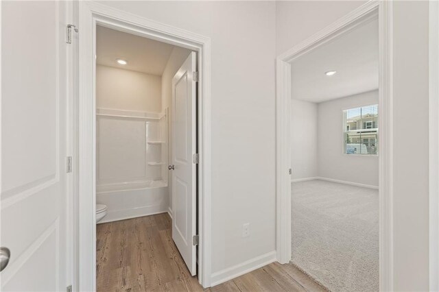 7127 Brushwood Bnd, Lithonia, GA 30058 - corridor with baseboards, light wood-type flooring, and recessed lighting