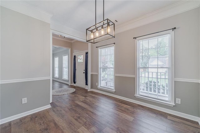 206 Belmont Dr, Monroe, GA 30655 - foyer entrance with ornamental molding, plenty of natural light, wood finished floors, and baseboards