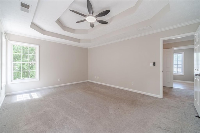 206 Belmont Dr, Monroe, GA 30655 - unfurnished room featuring a raised ceiling, ceiling fan, baseboards, carpet, and crown molding