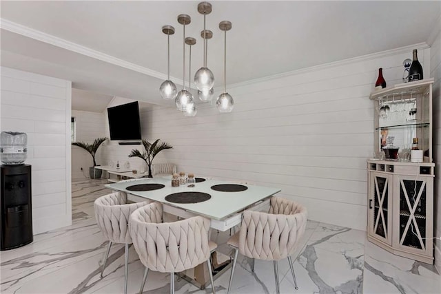 5219 Legendary Ln, Acworth, GA 30102 - dining area featuring marble finish floors, wood walls, ornamental molding, and a chandelier