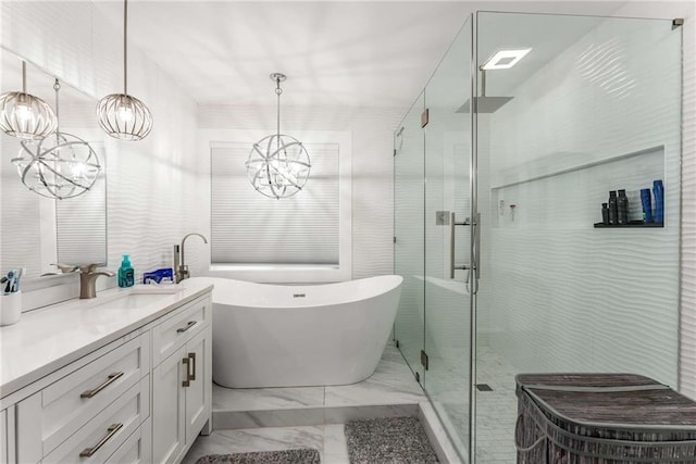 5219 Legendary Ln, Acworth, GA 30102 - full bathroom featuring a chandelier, marble look tile flooring, vanity, a stall shower, and a soaking tub