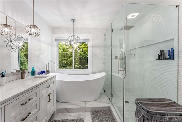 5219 Legendary Ln, Acworth, GA 30102 - full bathroom featuring a chandelier, marble finish flooring, vanity, and a soaking tub
