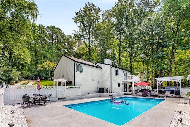 5219 Legendary Ln, Acworth, GA 30102 - view of pool featuring a pergola, an outdoor hangout area, a patio, and view of wooded area