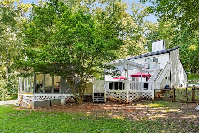 5219 Legendary Ln, Acworth, GA 30102 - rear view of property with a deck, a chimney, a sunroom, and a pergola