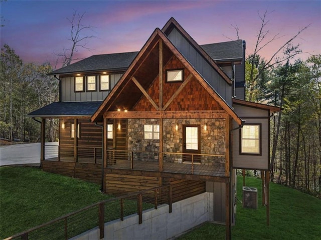 78 Pocola Ct, Ellijay, GA 30536 - exterior space with roof with shingles, central AC, stone siding, board and batten siding, and a yard
