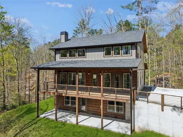 78 Pocola Ct, Ellijay, GA 30536 - back of property featuring roof with shingles, a patio, a chimney, and a yard
