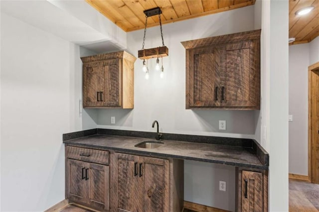 78 Pocola Ct, Ellijay, GA 30536 - kitchen featuring a sink, dark countertops, hanging light fixtures, and wood ceiling