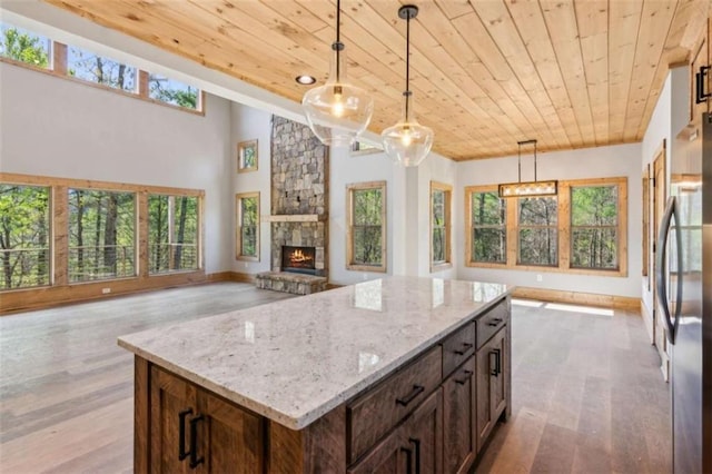 78 Pocola Ct, Ellijay, GA 30536 - kitchen with freestanding refrigerator, wood ceiling, and wood finished floors