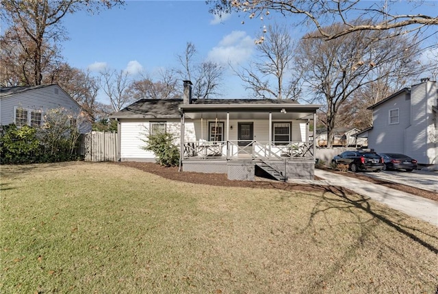 view of front facade with a porch and a front yard