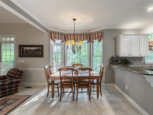 3580 Treeline Pass NE, Roswell, GA 30075 - dining space with ornamental molding and a chandelier