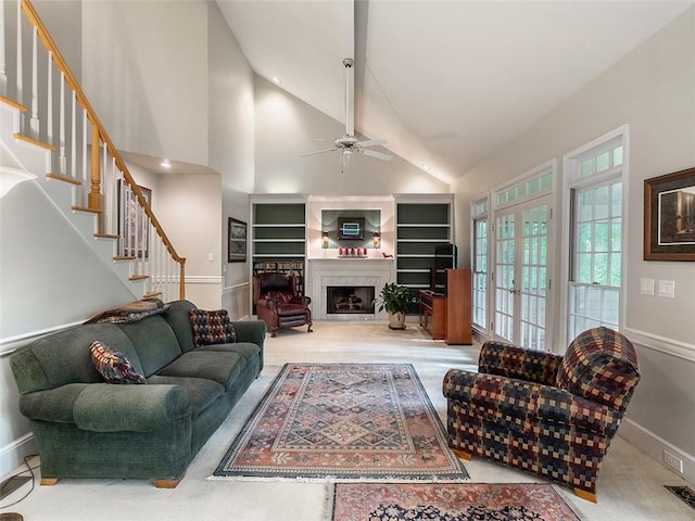 3580 Treeline Pass NE, Roswell, GA 30075 - living room featuring lofted ceiling, ceiling fan, stairs, and a fireplace