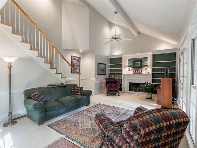 3580 Treeline Pass NE, Roswell, GA 30075 - carpeted living room with beamed ceiling, stairs, a ceiling fan, high vaulted ceiling, and a high end fireplace