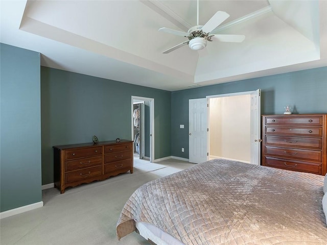 3580 Treeline Pass NE, Roswell, GA 30075 - bedroom featuring a raised ceiling, light carpet, ceiling fan, and a closet