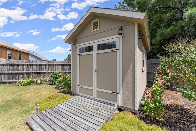 view of outdoor structure with a yard