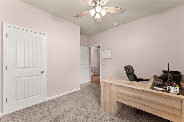 office featuring ceiling fan and carpet floors