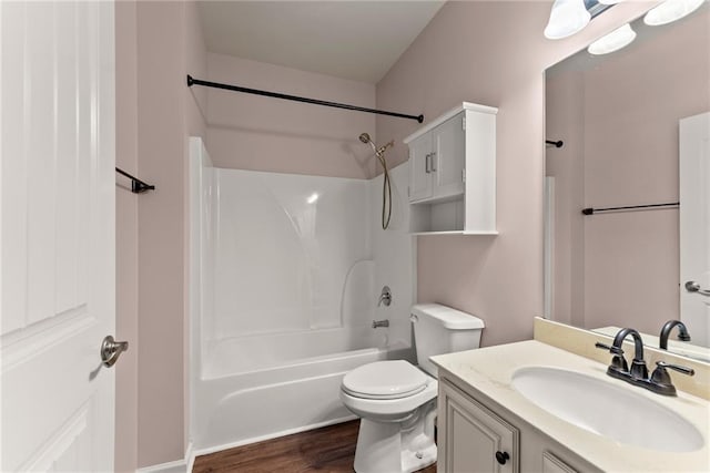 full bathroom featuring wood-type flooring, vanity, toilet, and bathtub / shower combination