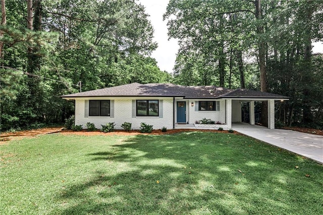 437 Valley Brook Dr NE, Atlanta, GA 30342 - ranch-style home featuring concrete driveway, a carport, a front yard, and brick siding