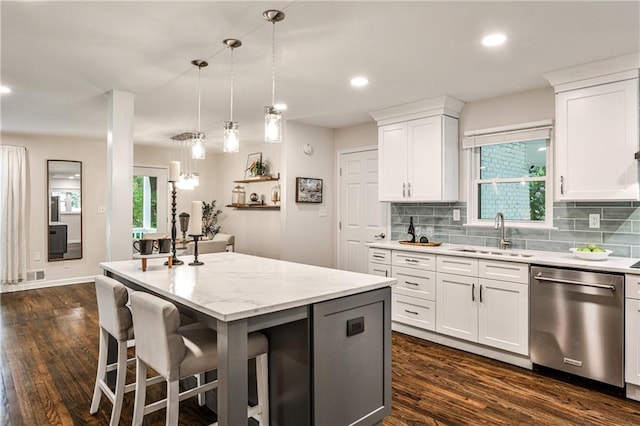 437 Valley Brook Dr NE, Atlanta, GA 30342 - kitchen with dishwasher, dark wood-style floors, white cabinetry, tasteful backsplash, and recessed lighting