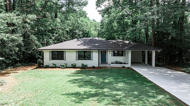 437 Valley Brook Dr NE, Atlanta, GA 30342 - single story home featuring concrete driveway, an attached carport, a front lawn, and brick siding