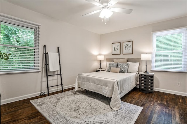 437 Valley Brook Dr NE, Atlanta, GA 30342 - bedroom featuring multiple windows, wood finished floors, and a ceiling fan
