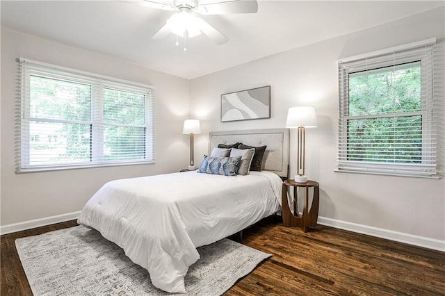 437 Valley Brook Dr NE, Atlanta, GA 30342 - bedroom with multiple windows, wood finished floors, and a ceiling fan