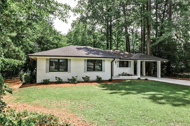 437 Valley Brook Dr NE, Atlanta, GA 30342 - ranch-style house with concrete driveway, brick siding, a carport, and a shingled roof