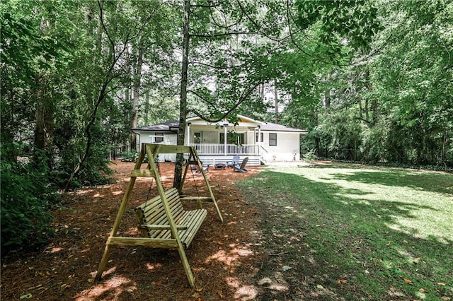 437 Valley Brook Dr NE, Atlanta, GA 30342 - rear view of property with a lawn