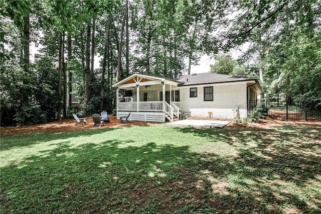 437 Valley Brook Dr NE, Atlanta, GA 30342 - back of house with a patio, a ceiling fan, and brick siding