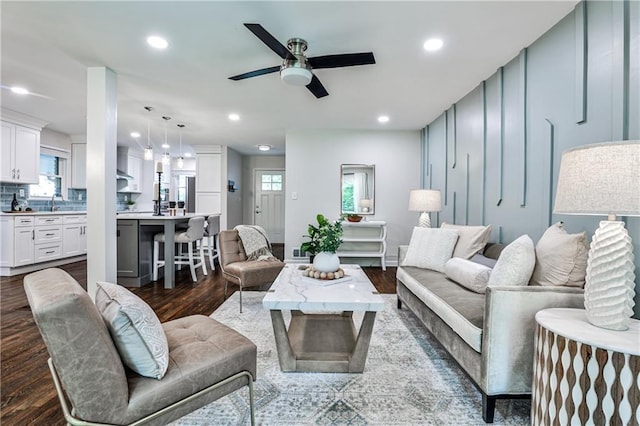 437 Valley Brook Dr NE, Atlanta, GA 30342 - living area featuring dark wood-style floors, a ceiling fan, and recessed lighting