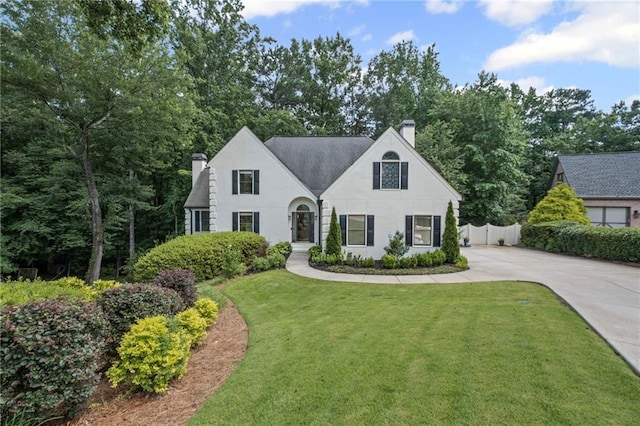 3648 Sope Creek Farm SE, Marietta, GA 30067 - view of front facade featuring a chimney, driveway, and stucco siding