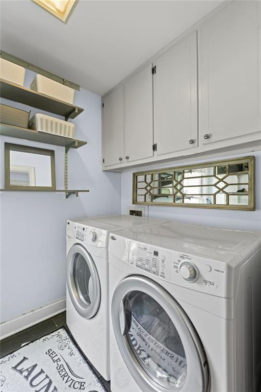 3648 Sope Creek Farm SE, Marietta, GA 30067 - washroom featuring cabinet space and independent washer and dryer