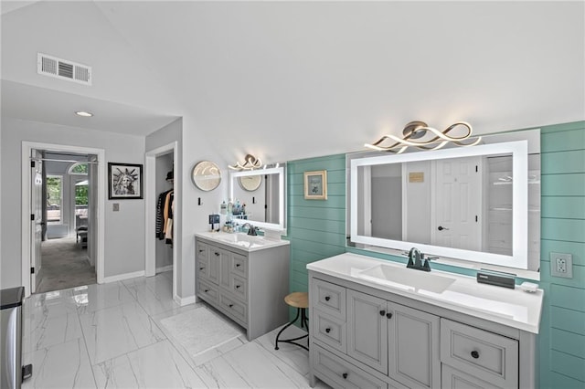 3648 Sope Creek Farm SE, Marietta, GA 30067 - full bath with two vanities, marble look tile flooring, and lofted ceiling