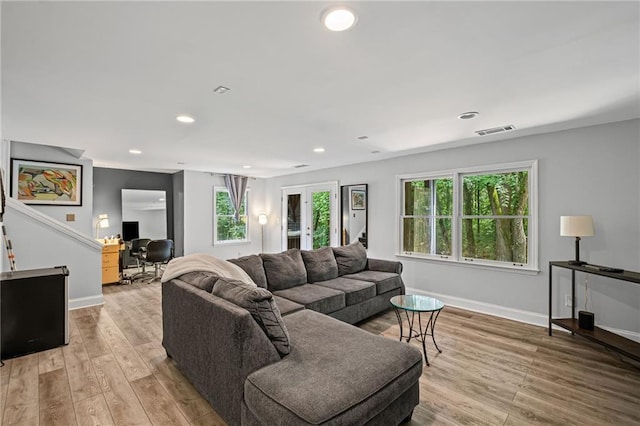 3648 Sope Creek Farm SE, Marietta, GA 30067 - living room featuring light wood finished floors, recessed lighting, a desk, and stairway