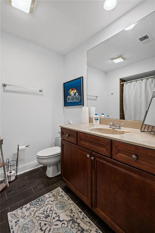 3648 Sope Creek Farm SE, Marietta, GA 30067 - bathroom with vanity, wood tiled floors, and curtained shower