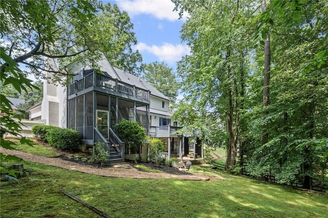 3648 Sope Creek Farm SE, Marietta, GA 30067 - rear view of property featuring a balcony, a lawn, and a sunroom