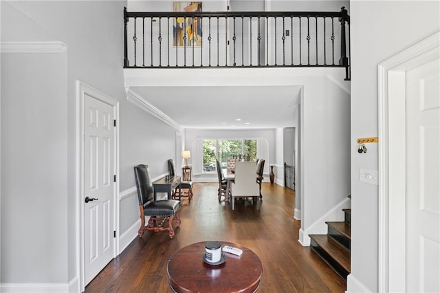 3648 Sope Creek Farm SE, Marietta, GA 30067 - living room with wood finished floors, stairway, and ornamental molding