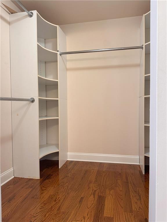 1055 Worthington Hills Dr, Roswell, GA 30076 - spacious closet with wood finished floors