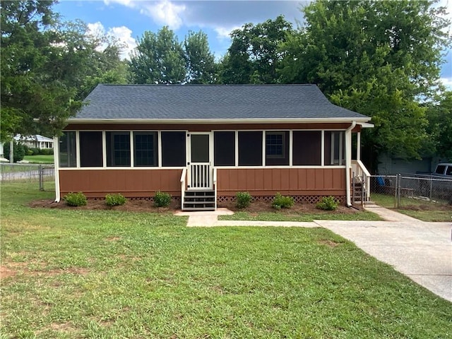 25 Forrest Ln, Cartersville, GA 30121 - view of front of property with a sunroom, roof with shingles, and entry steps