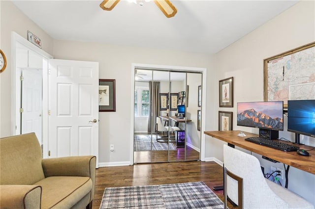 home office with dark wood-style floors, baseboards, and ceiling fan