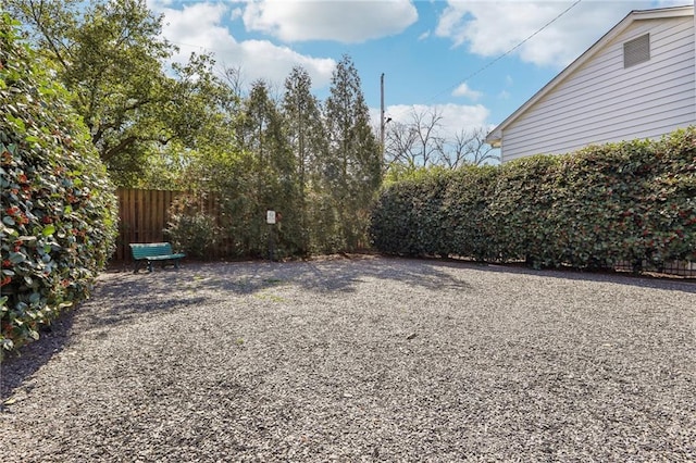 view of yard with fence