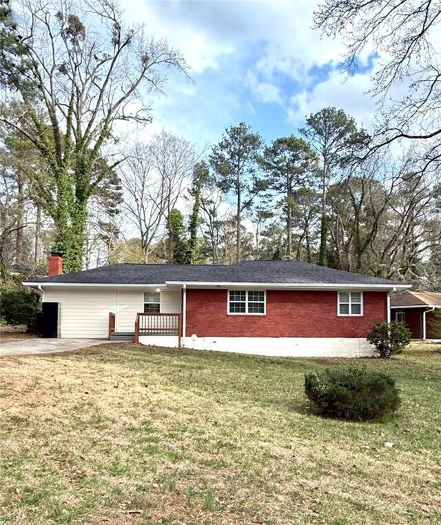 2182 Rosewood Rd, Decatur, GA 30032 - view of front of house with a front yard and brick siding