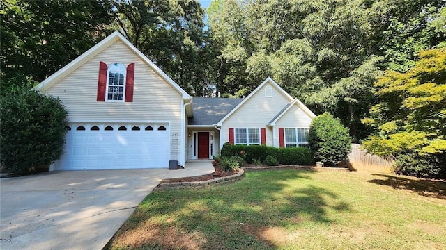 view of front property with a front lawn and a garage