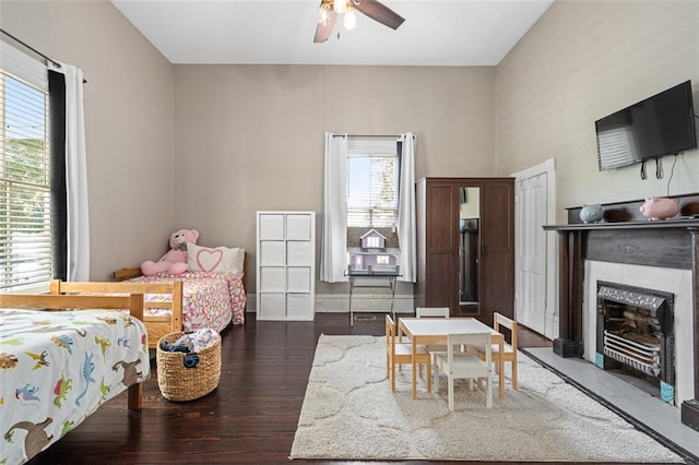 161 N Barton St, Norcross, GA 30071 - bedroom featuring wood finished floors and a glass covered fireplace