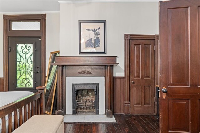 161 N Barton St, Norcross, GA 30071 - entrance foyer with dark wood-style floors, a fireplace, ornamental molding, and wainscoting