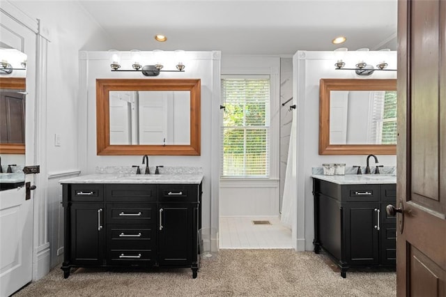 161 N Barton St, Norcross, GA 30071 - full bath with two vanities, recessed lighting, and curtained shower